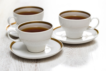 Cups with tea or coffee