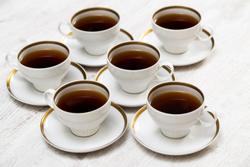 Cups with tea or coffee