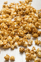 Popcorn on wooden table