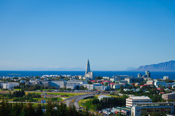 Beautiful super wide-angle aerial view of Reykjavik, Iceland wit - obrazy, fototapety, plakaty