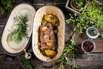 Roasted venison with herbs and vegetables - obrazy, fototapety, plakaty