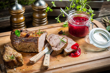 Healthy venison with cranberries and rosemary