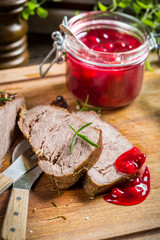 Venison served with cranberry sauce