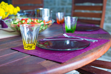 Closeup of beautiful color tableware for decorated table