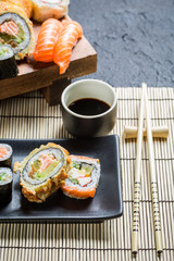 Sushi served with soy sauce