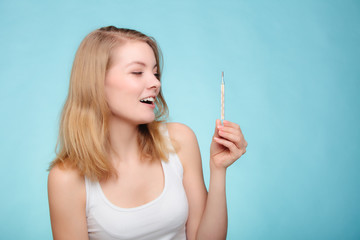Obraz premium Flu. Sick girl holding thermometer. Health.