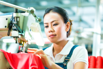 Seamstress in a chinese textile factory