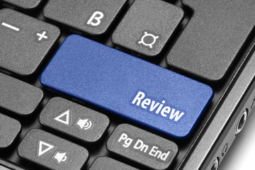 Review. Blue hot key on computer keyboard