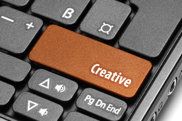 Creative. Orange hot key on computer keyboard