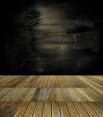 Wooden floor and blackboard wall