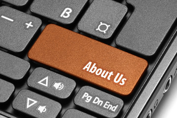 About Us. Orange hot key on computer keyboard