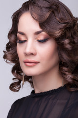 Fototapeta premium Sensual brunette professional make up eyes closed