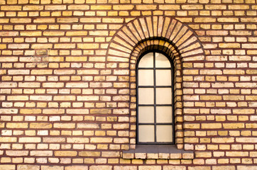Fototapeta na wymiar Separate window in brick wall