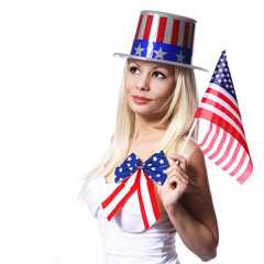 Patriotic Woman with American Flag isolated on white