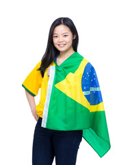 Excited football supporter with Brazil flag