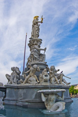 Fototapeta na wymiar Pallas Athene fountain at front of Austrian Parlament, Vienna