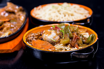 Pork in black bean souse with green pepper and onion