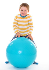 little boy with a big ball.