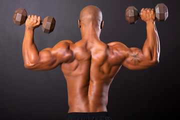 rear view of african bodybuilder training