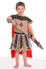 little boy dressed as a knight.