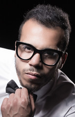 Fototapeta premium Portrait of man in white shirt and glasses