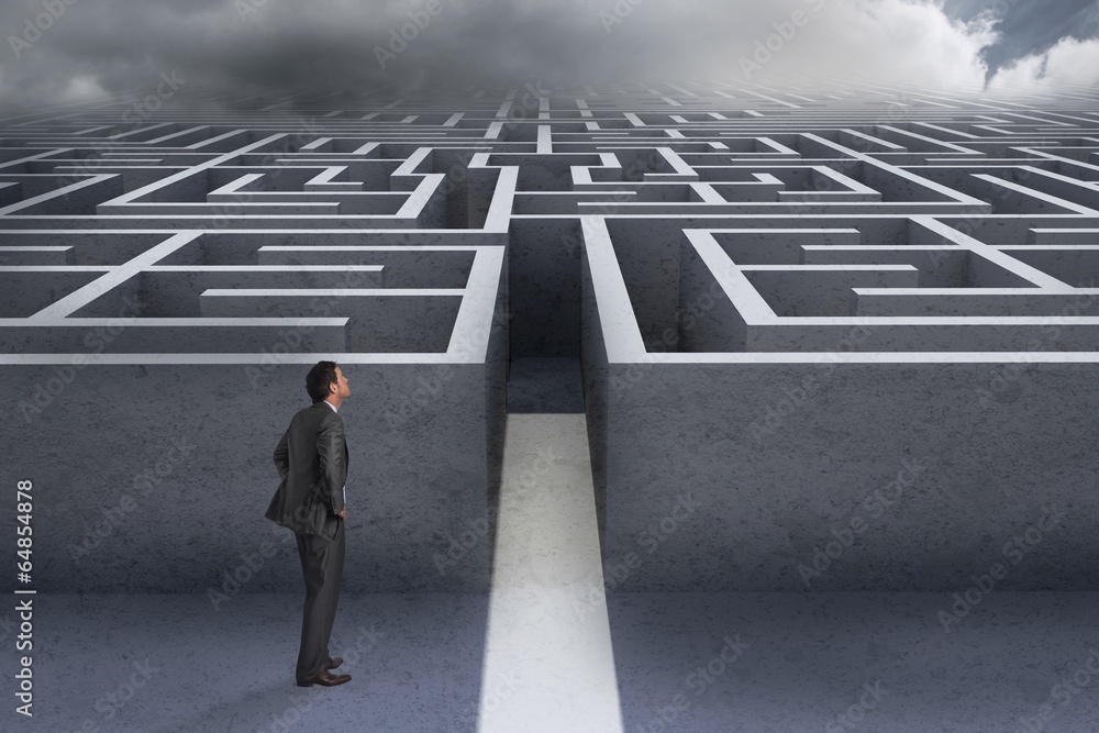 Poster composite image of smiling businessman with hands on hips