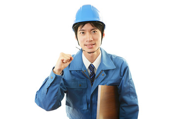 ガッツポーズの作業員