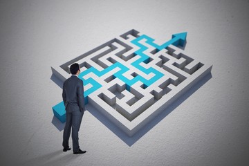 Composite image of businessman standing