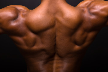 african muscular bodybuilder's back