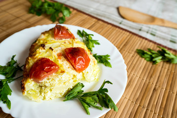 Baked fresh cabbage with tomatoes