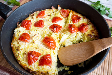 Baked fresh cabbage with tomatoes
