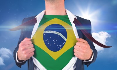 Businessman opening shirt to reveal brasil flag
