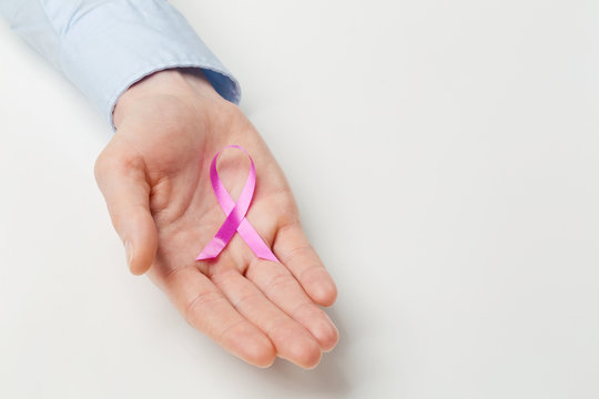 Female Hand with Pink Ribbon