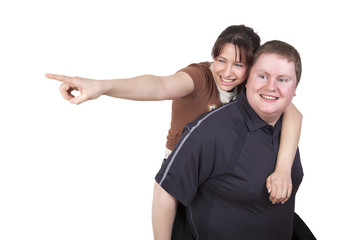 Man carrying woman piggyback