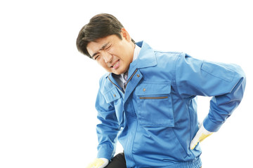 腰痛を訴える作業員