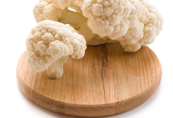 cauliflower and a chopping board