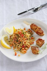 Quinoa salad with vegetables and roasted meat