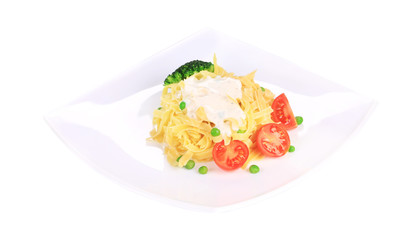 Pasta with dressing and green beans.