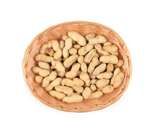 Basket full with peanuts.