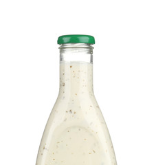 Glass bottle of white sauce.