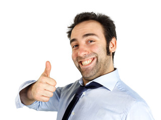 Happy young businessman showing thumb up gesture