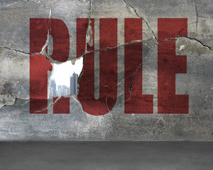 Crack wall with hole and rule word on it