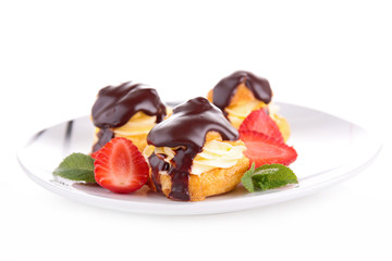 pastry filling with cream and chocolate sauce