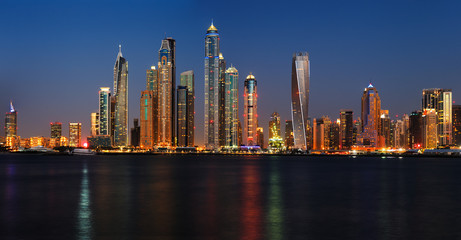 Fototapeta na wymiar Dubai Marina at dusk as viewed from Palm Jumeirah in Dubai, UAE