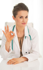 Medical doctor woman showing ok gesture