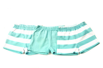 Close up of three newborn panties with stripes, infant underwear