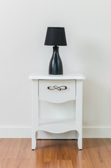 Lamp on bedside table