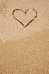 Fototapeta na wymiar heart shape on beach