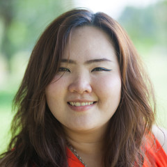 Fototapeta premium Close up of happy fatty woman