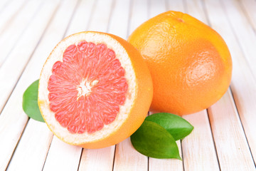 Ripe grapefruit on table close-up